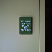 This House Runs On Snacks And Tantrums | Ceramic Magnet: Cornflower & Hunter Green