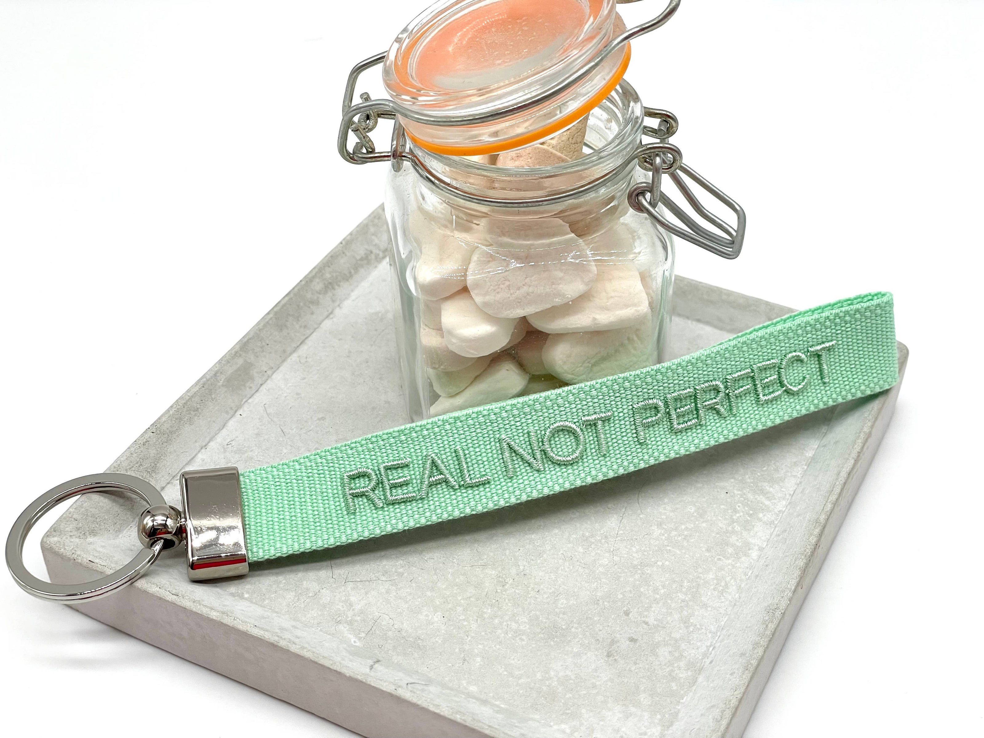 REAL NOT PERFECT woven embroidered keychain