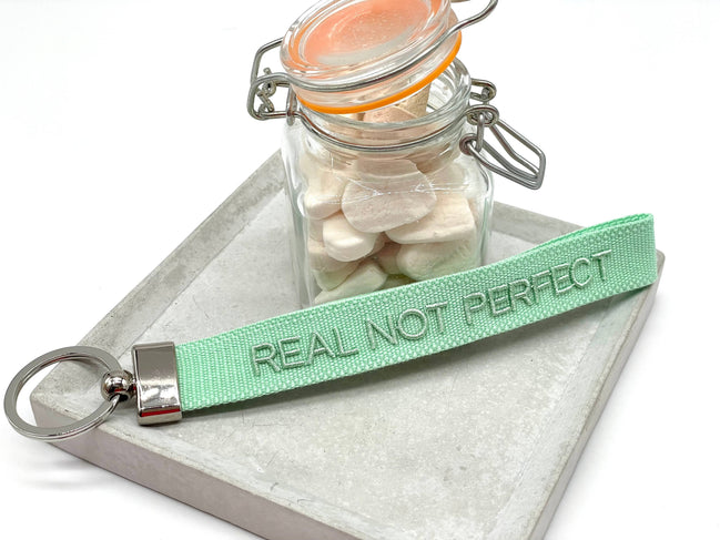 REAL NOT PERFECT woven embroidered keychain