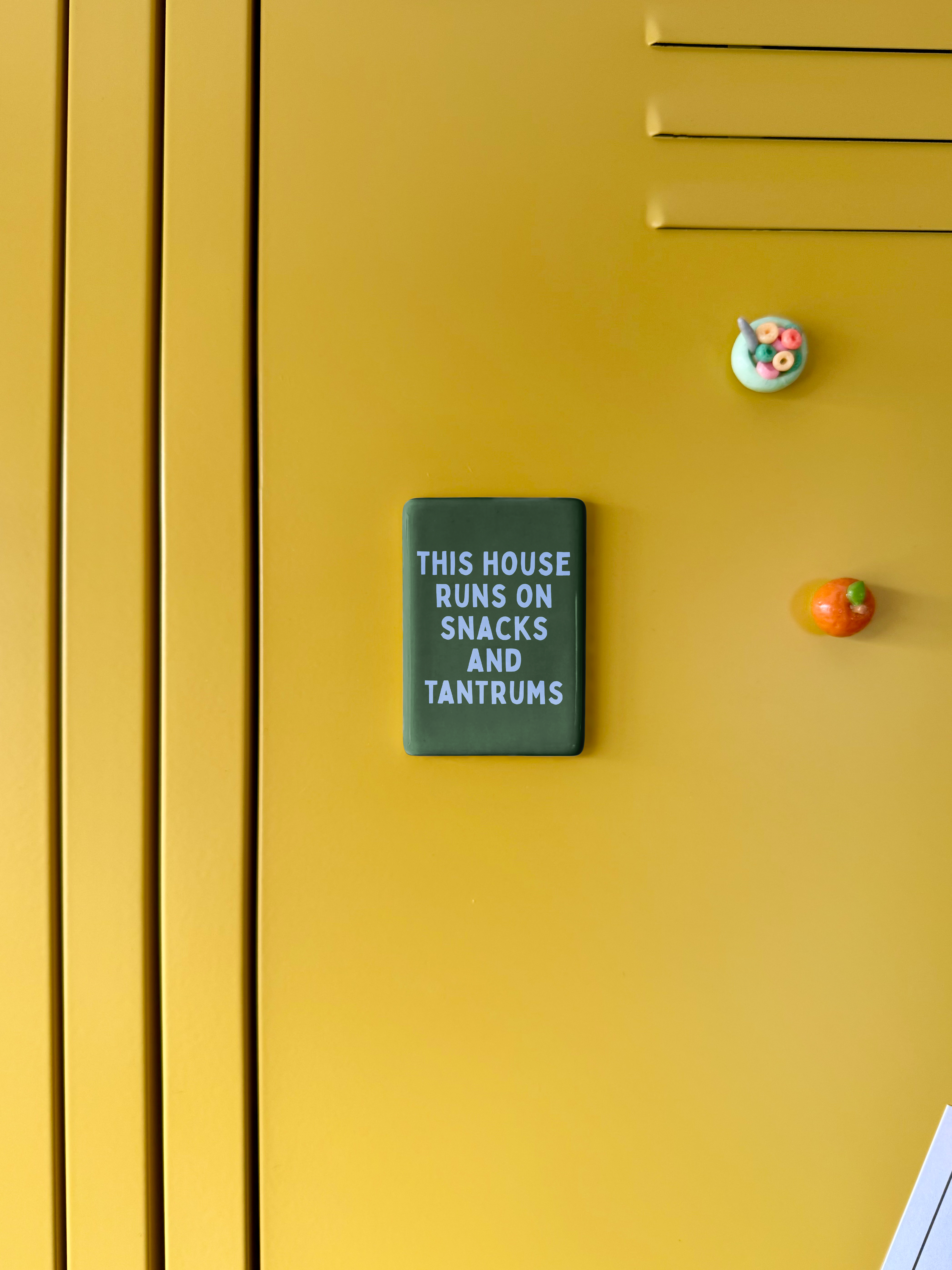 This House Runs On Snacks And Tantrums | Ceramic Magnet: Cornflower & Hunter Green