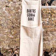 This b* Bakes Apron - adults with front pocket: Beige /black text