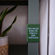 This House Runs On Snacks And Tantrums | Ceramic Magnet: Cornflower & Hunter Green