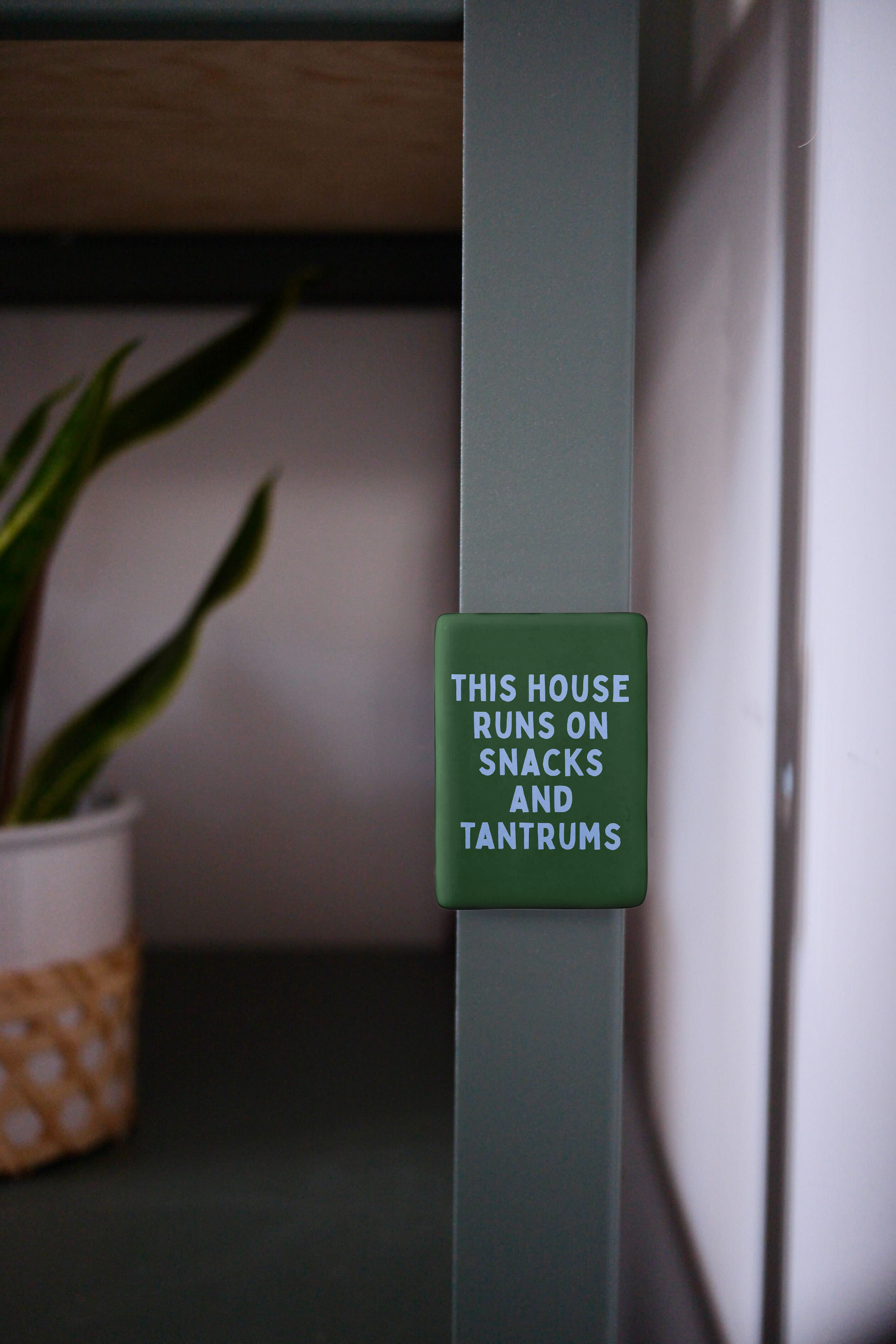 This House Runs On Snacks And Tantrums | Ceramic Magnet: Cornflower & Hunter Green
