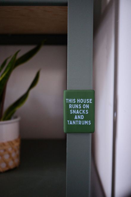 This House Runs On Snacks And Tantrums | Ceramic Magnet: Cornflower & Hunter Green